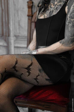 Asymmetric Bat Fishnet Tights